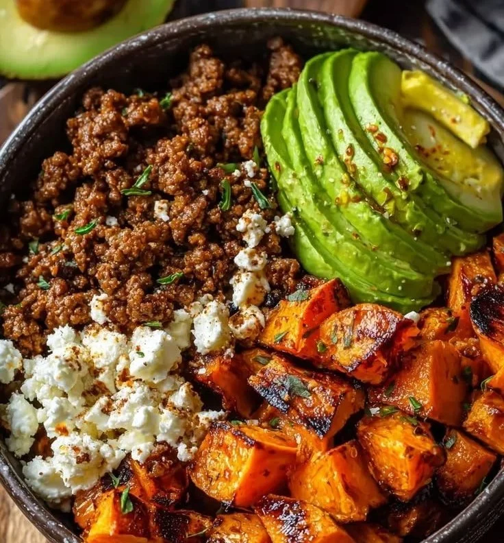 Ground Beef Hot Honey Bowl topped with fresh ingredients and drizzled with hot honey.